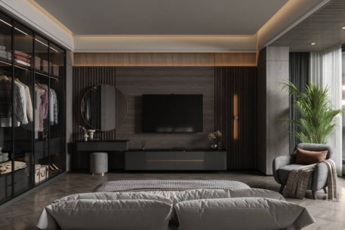 modern bedroom interior with television set, dressing table, walk in closet, armchair and rear view of double bed at night - home decoration stock pictures, royalty-free photos & images