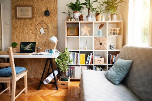 modern cozy apartment with worktable and lots of personal accessories - garden decoration stock pictures, royalty-free photos & images
