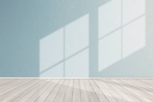 modern empty room with wooden floor and large blue concrete wall - food stock pictures, royalty-free photos & images