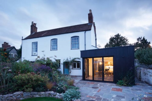 modern extension built onto the side of a listed period property. - home decoration stock pictures, royalty-free photos & images