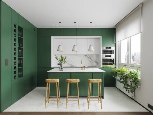 modern kitchen interior with kitchen island, wood stools, pendant lights and green cabinets - home decoration stock pictures, royalty-free photos & images