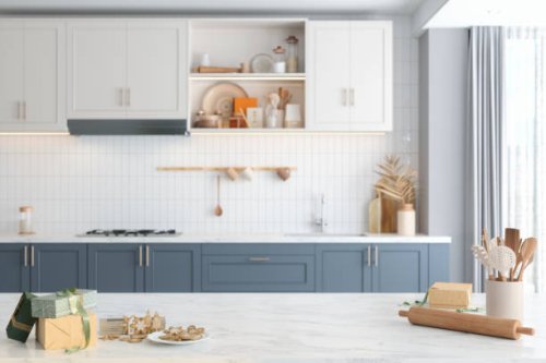 modern kitchen with homemade gingerbread cookies and gift boxes on kitchen counter. baking and selling cookies - home decoration stock pictures, royalty-free photos & images