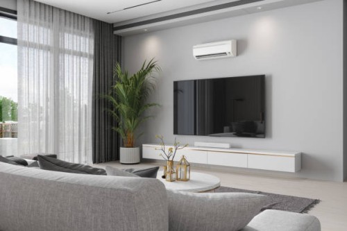 modern living room interior with air conditioner, television set, potted plant and sofa - home decoration stock pictures, royalty-free photos & images