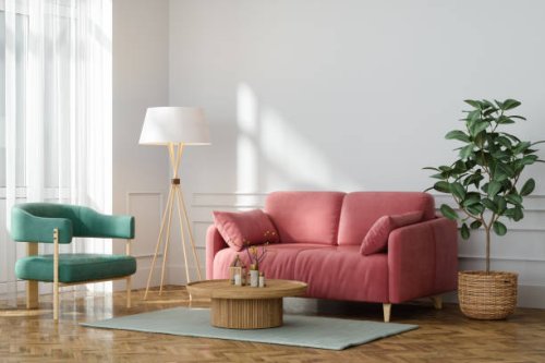 modern living room interior with pink sofa, green armchair, potted plant and floor lamp - home decoration stock pictures, royalty-free photos & images