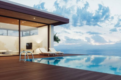 modern luxury house with infinity pool at dawn - garden decoration stock pictures, royalty-free photos & images