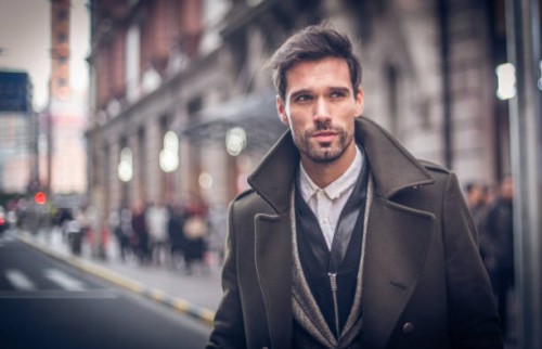 modern man in winter coat - fashion stock pictures, royalty-free photos & images