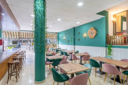 modern restaurant interior design with green and pink chairs - home decoration stock pictures, royalty-free photos & images