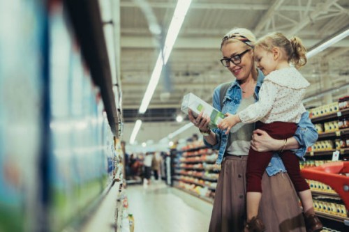 mom and daughter shopping together in the supermarket - food stock pictures, royalty-free photos & images