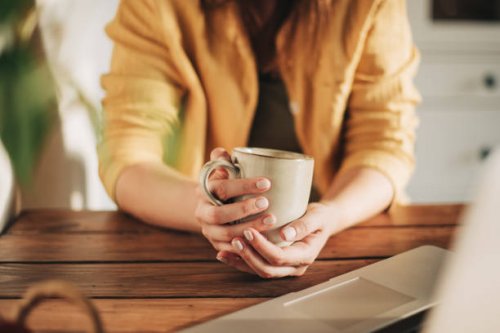 morning, breakfast coffee and female hands pouring water in cup from retro kettle in kitchen at home. woman in pajamas brewing tea or making a beverage on counter to start the day. - coffee stock pictures, royalty-free photos
