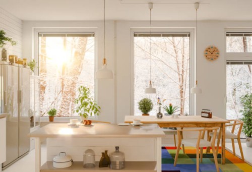 morning sun streaming into the kitchen, winter scene - home decoration stockfoto's en -beelden