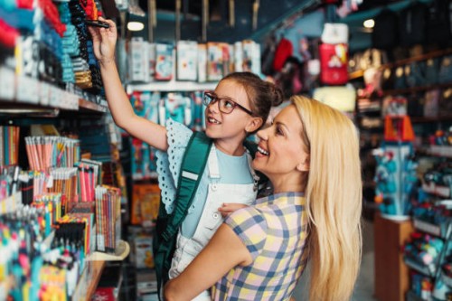 mother and daughter in a bookstore - home decoration stock pictures, royalty-free photos & images