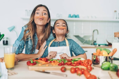 mother and daughter with carrot mustaches - food stock pictures, royalty-free photos & images
