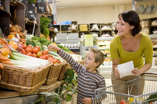 mother and son in supermarket - food stock pictures, royalty-free photos & images
