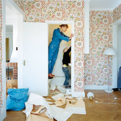 mother and son renovating bathroom - home decoration stock pictures, royalty-free photos & images