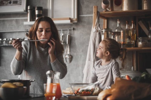 mother on the phone, cooking - food stock pictures, royalty-free photos & images