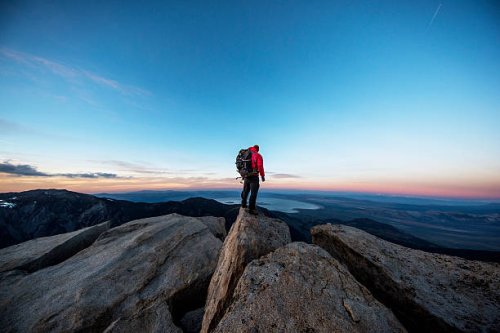 mountain man on a summit - travel stock pictures, royalty-free photos & images