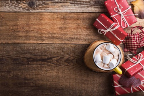 mug of hot chocolate and christmas gift boxes - home decoration stock pictures, royalty-free photos & images