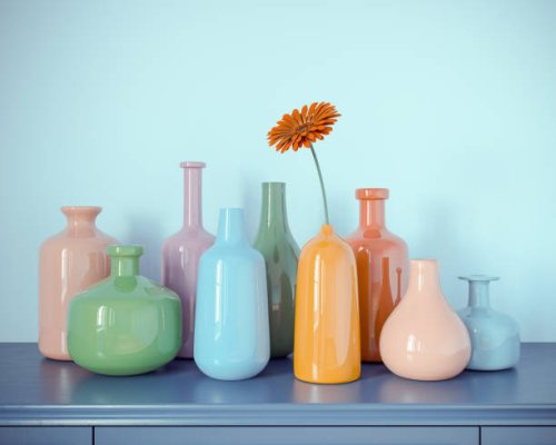 multicolored bottles vases from glass with one daisy flower on blue dresser and blue wall abstract background. 3d rendering. vintage retro colored - home decoration stock pictures, royalty-free photos & images