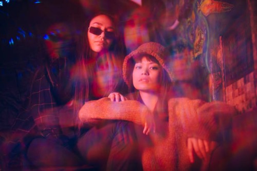 multiple exposure of young female friends sitting together at illuminated restaurant - fashion stock pictures, royalty-free photos & images