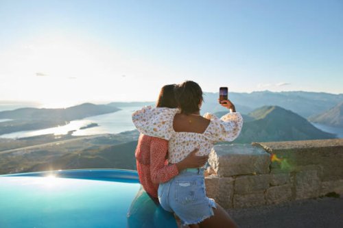multiracial friends taking selfie on smart phone - travel stock pictures, royalty-free photos & images
