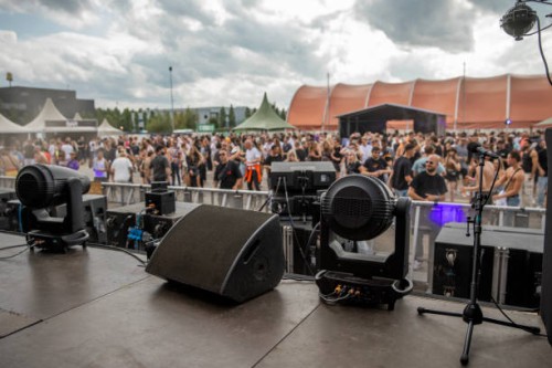 music festival equipment and staging and dancing crowd - concert stock pictures, royalty-free photos & images