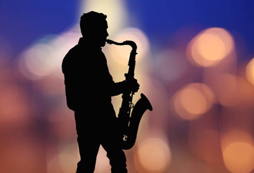 musician playing the saxophone, bokeh background - concert stock pictures, royalty-free photos & images
