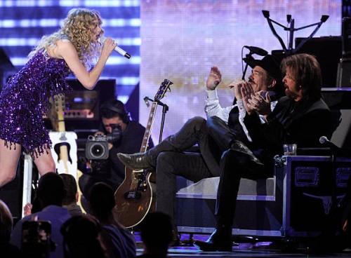 Musician Taylor Swift performs onstage with musicians Kix Brooks and Ronnie Dunn of the band Brooks & Dunn during Brooks & Dunn's The Last Rodeo Show...