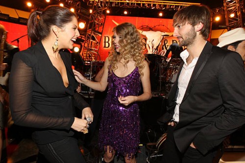Musicians Hillary Scott and Dave Haywood of the band Lady Antebellum pose with Taylor Swift backstage during Brooks & Dunn's The Last Rodeo Show at...