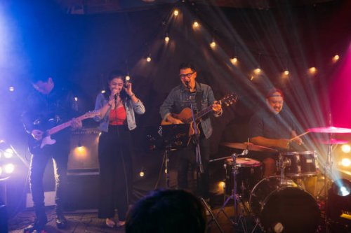 musicians in concert. - concert stock pictures, royalty-free photos & images