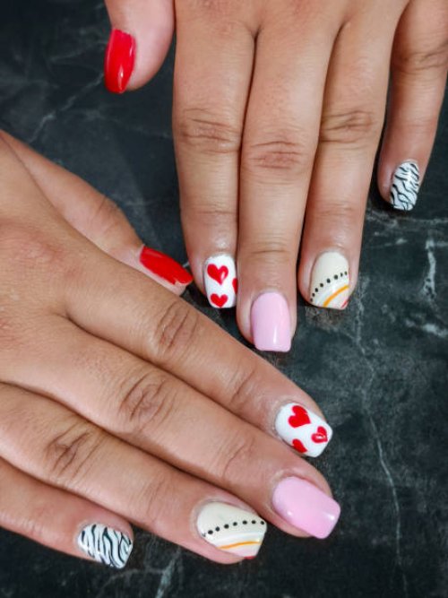 nails art, design of lines, hearts and animal print - nails art stock pictures, royalty-free photos & images