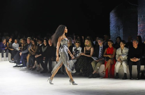 Naomi Campbell walks the runway as guests including Letitia Wright, Eva Green, Francois-Henri Pinault, Cate Blanchett, Dame Anna Wintour, Elle...