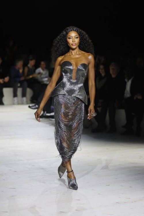 Naomi Campbell walks the runway at the Alexander McQueen SS24 show during Paris Fashion Week at Le Carreau du Temple on September 30, 2023 in Paris,...