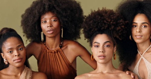 natural beauty, model and black women with an afro hairstyle with a fashion pose. portrait of female empowerment of people with diversity and beautiful skin looking stunning with a green background - fashion stock pictures, r