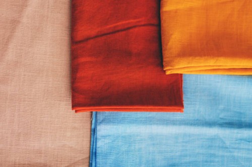 natural vibrant linen cloth fabric textile background. top view. flat lay, copy space. - fashion stock pictures, royalty-free photos & images