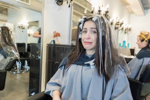 nervous young woman at hair salon - hairstyle stock pictures, royalty-free photos & images