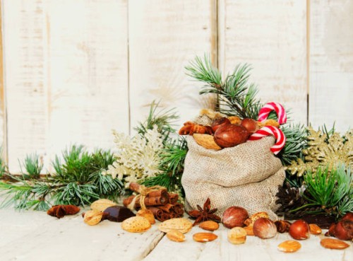 new year or christmas composition with walnuts, mulled wine, hazelnuts - garden decoration stock pictures, royalty-free photos & images