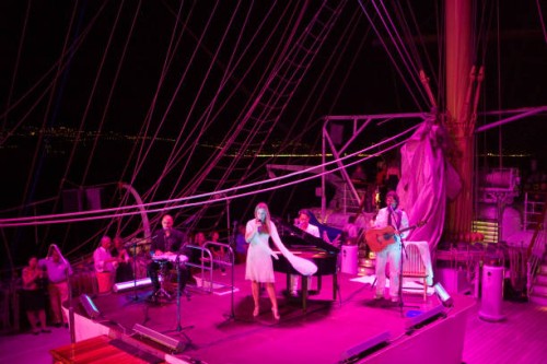 night-time concert by band "dolce vita" on deck of sailing cruiseship royal clipper (star clippers cruises) during mediterranean sea voyage. - concert stock pictures, royalty-free photos & images