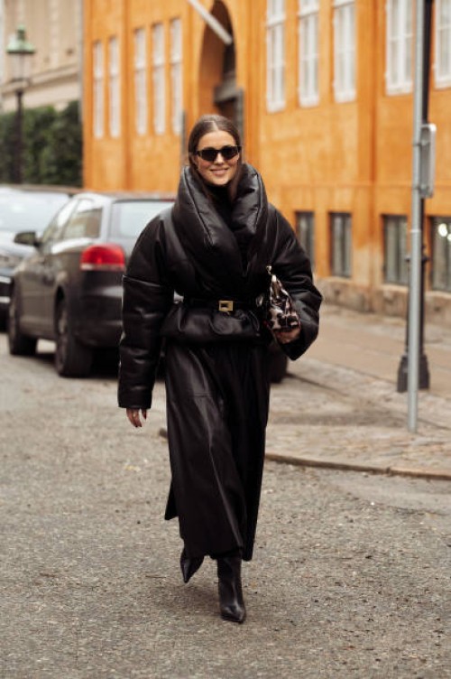 Nina Sandbech wears a black leather skirt and black leather jacket with a belt outside LOvechild 1979 during the Copenhagen Fashion Week AW24 on...