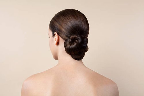 nude young woman with up do, back view. - hairstyle stock-fotos und bilder