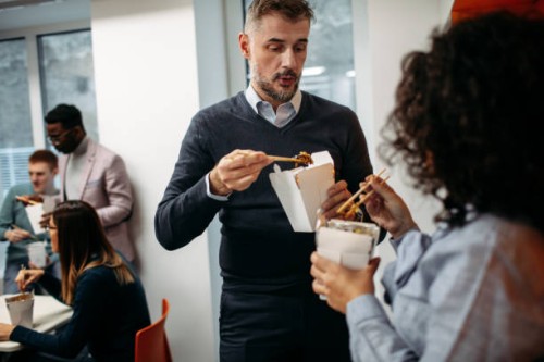 office lunch break - junk food stock pictures, royalty-free photos & images