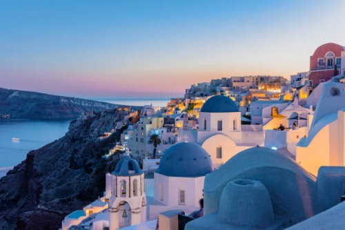 oia, santorini island, cyclades, greece. twilight, houses and churches after sunset - travel stock pictures, royalty-free photos & images