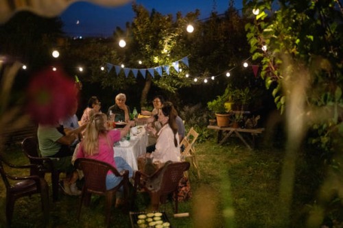 old friends having fun time on birthday party at backyard - garden decoration stock pictures, royalty-free photos & images