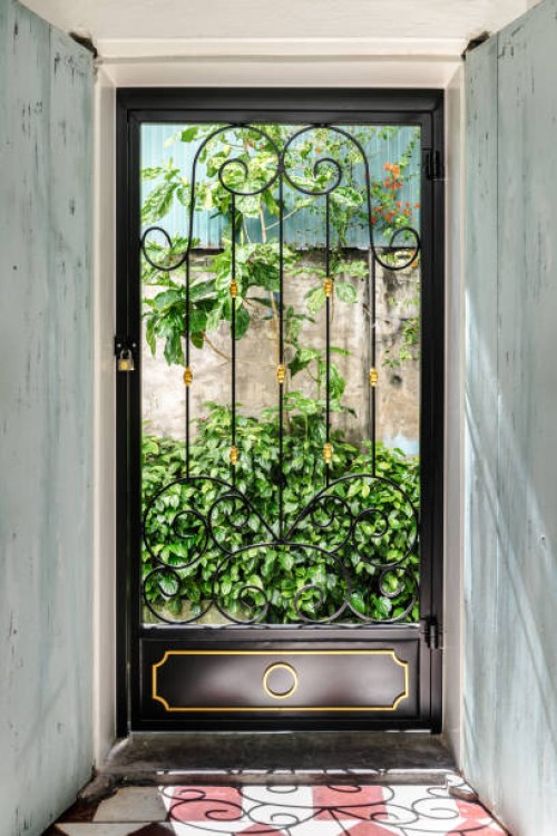 old retro style door with sunlight - garden decoration stock pictures, royalty-free photos & images