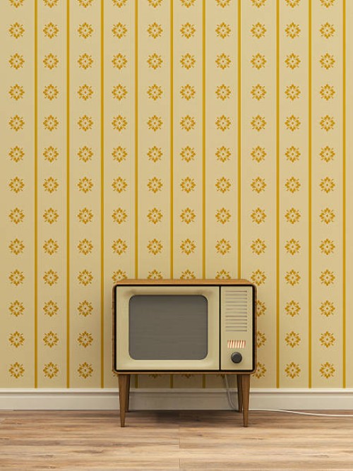 old television in front of yellow patterned wallpaper - home decoration stock illustrations