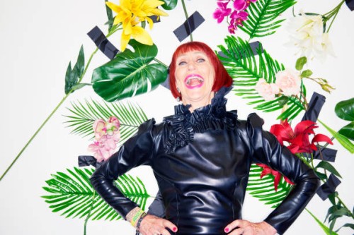 older woman laughing in couture clothing - fashion stock pictures, royalty-free photos & images