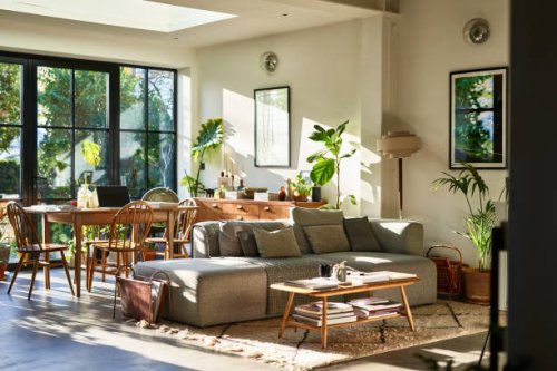 open plan living space in residential house with natural light and retro furniture - home decoration stock pictures, royalty-free photos & images
