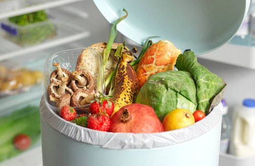 out of date rotting food in dustbin - food stock pictures, royalty-free photos & images