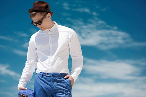 outdoor shot of young fashionable guy - fashion stock pictures, royalty-free photos & images