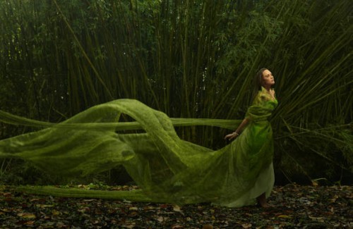 pacific islander woman in flowing green dress outdoors - fashion stock pictures, royalty-free photos & images