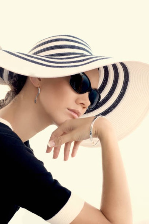 pacific islander woman wearing sunhat - fashion stock pictures, royalty-free photos & images